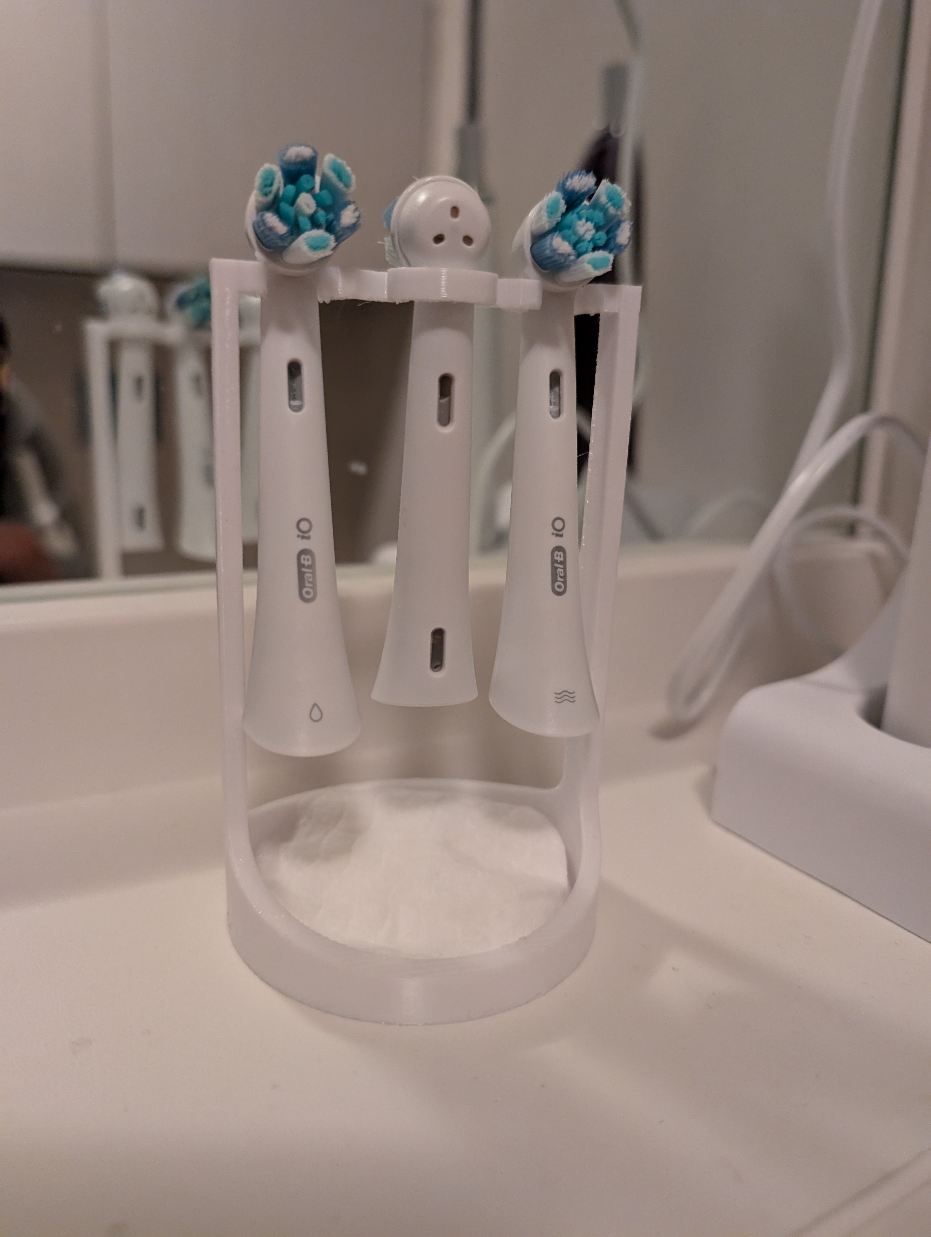 Toothbrush head holder
